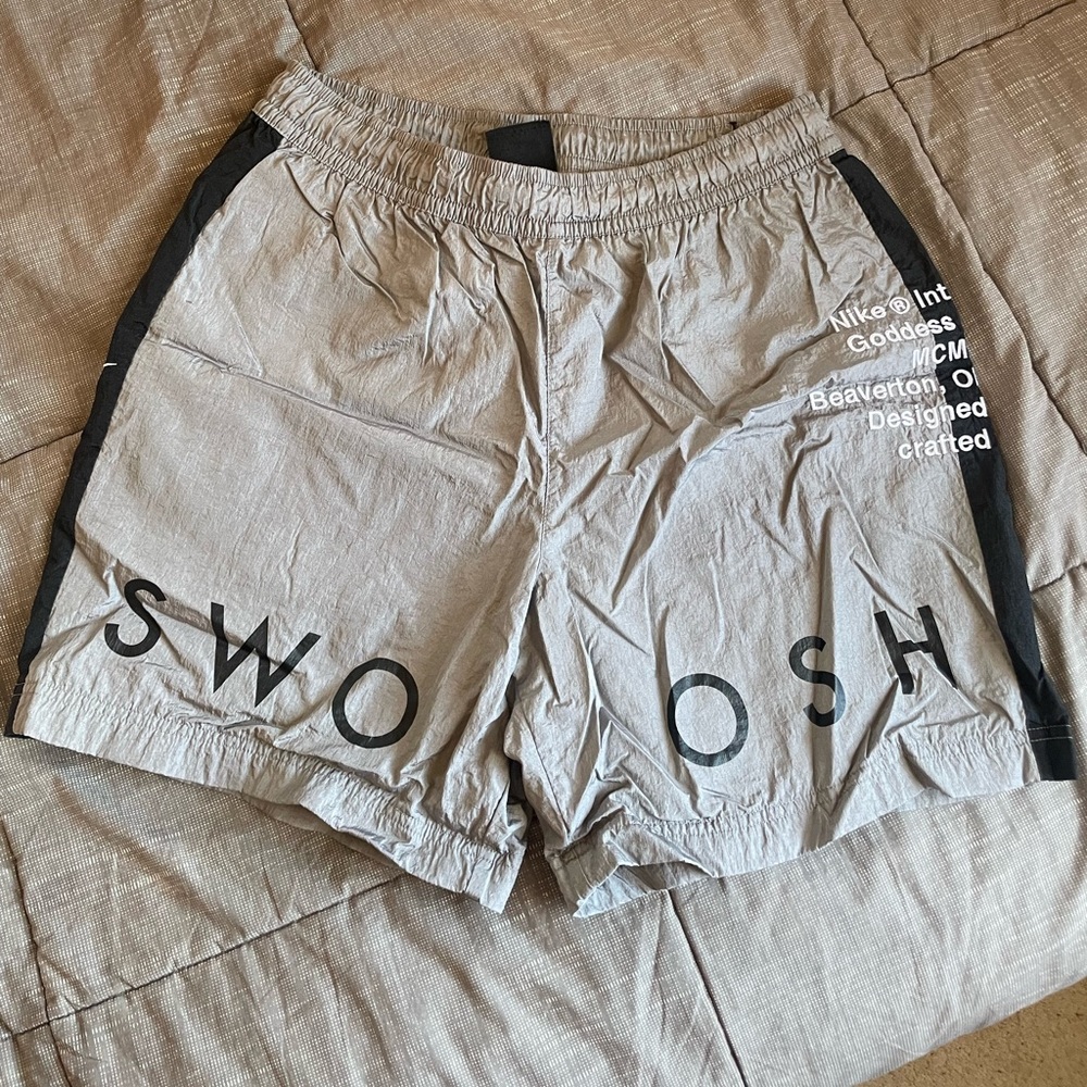 Nike “swoosh” logo shorts